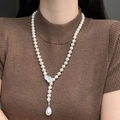 Franse stijl lange parelketting met diamanten blad en druppelvormige parel - Strass Blad Parelketting