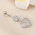 Macro shot of stainless steel belly ring with heart pendant and sparkling zircon stone - Full Zirconia Heart Silver