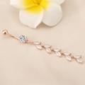 Detail of rose gold belly ring with leaf tassel and marquise cut cubic zirconia stones - Rose Gold