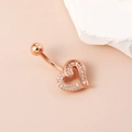 Rose gold heart belly button ring with sparkling zircon stones on a pink background - Mini Hollow Heart Rose Gold