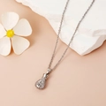 Elegante collana con ciondolo a sacchetto di soldi, micro-zirconi e segno del dollaro - Argento