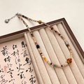 Handgemaakte kralenketting met schelphanger en kleurrijke stenen in etnische stijl - Schelp Kleurrijke Kralenketting
