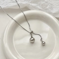 Minimalistische silberne Halskette mit doppeltem Wassertropfen und eleganter Schlangenkette - Silber