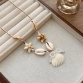 Bohemian beach style necklace with brown woven cord, starfish, sea shells and pearl bow - Pearl Bow Shell Pendant Necklace