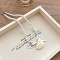 Collier de perles étoiles de mer et coquillages avec perles colorées et nœud blanc - Collier Pendentif Coquillage Perle Blanche