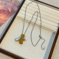 Titanium stalen ketting met gele natuursteen druiventros hangers in zilveren afwerking - Gele Natuursteen Kralenketting