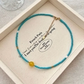 Handgemaakte turquoise kralenketting met gele parel en goudkleurige sluiting - Turkoois Gele Chalcedoon Ketting