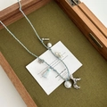 Blue and yellow woven cord necklace with dog charm, tassels, and pearl accents - Dog Tassel / Blue Series