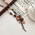 Sautoir rétro ethnique avec grand pendentif tournesol en tissu marron et fleurs - Collier à Gland de Fleur