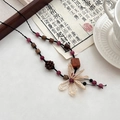 Collier ethnique avec pendentif fleur, perles en bois et corde tissée au style rétro - Collier Fleur Tissé à la Main
