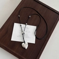 Minimalist silver heart pendant necklace with hammered texture and black adjustable cord - Adjustable Heart Black Rope Necklace