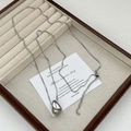 Polished silver teardrop pendant necklace with delicate box chain on velvet tray - Box Chain