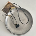 Tiger eye and obsidian long sweater necklace with mini black bag pendant and golden beads - Black Obsidian Bag Pendant Necklace