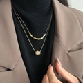 Dubbellaagse gouden titanium stalen ketting met een cilindrische zirkoon hanger - Gouden Dubbellaagse Taille Hanger Ketting