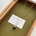 Elegant necklace featuring a dark brown pearl pendant with white crystal inlay - Black Glass Bead Necklace