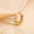 Elegant gold-plated nose ring with cubic zirconia on champagne silk backdrop - Gold