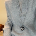 Vintage silver heart pendant necklace with black wood detail on grey sweater - Stainless Steel Chain Black Wrapped Heart
