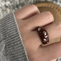 French vintage dark red enamel wide ring with silver heart charms on model hand - Chocolate Color Multi-Heart Metal Decor Style