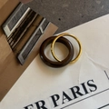 Set de anillos de ojo de tigre y obsidiana con bandas finas de oro y resina marrón - Anillo Doble Ojo de Tigre Dorado