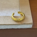 Adjustable golden woven ring with sparkling cubic zirconia in a matte finish - Braided Zirconia (Gold)