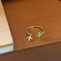Golden open ring with zircon cross design and hanging fleur-de-lis charm detail - Cross Anchor (Gold)