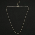 Detailed view of golden bead necklace chain with adjustable clasp on black background - 45+5cm / Bead Chain / Gold
