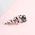 Detailed close-up of oval cut mystic topaz stud earrings in a classic four-prong setting - Multicolor 6*8mm