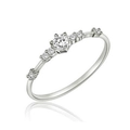 Detailed side view of minimalist silver ring with sparkling round zircon accents - US 6 / Silver