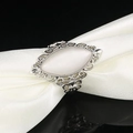 Macro shot of vintage silver ring featuring a large white marquise-cut cat eye gemstone - US 6 / White