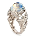 Elegant swan-shaped silver ring with a glowing round moonstone and sparkling crystals - US 7 / White