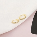 Pair of gold-plated huggie earrings with small inlaid cubic zirconia stones - 10mm / Gold