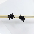 Minimalist black spider stud earrings for men and women featuring faceted black gemstones - Spider / Black
