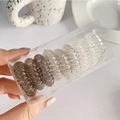Lot de 9 élastiques à cheveux torsadés dégradés dans une boîte de rangement claire - Set Dégradé Gris