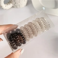 Lot de 10 élastiques à cheveux spirales dégradés noirs dans une boîte en plastique - Set Noir Et Gris
