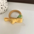 Coletero elástico amarillo con lazo y pequeña etiqueta verde de carita sonriente - Amarillo