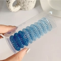 Élastiques spirales pour cheveux dégradé bleu en boîte avec 10-12 anneaux souples - Set Dégradé Bleu