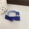 Coletero con lazo de pana azul, etiqueta de cara sonriente y banda de tela elástica suave - Azul