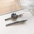 Two-piece silver metal hair clip set with smiley face and engraved Smile lettering - Silver
