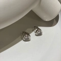 Silver hoop earrings featuring heart-shaped zircon crystals and minimalist metal finish - Ear Buckle / Silver with White Zirconia