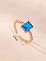 Detail view of 1.9cm rose gold ring with rectangle blue gemstone and pave diamonds - US 6 / Rose Gold