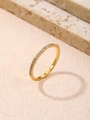 Detailed macro view of minimalist gold plated ring with paved sparkling zircons on stone - Size 7 / Gold
