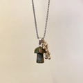 Titanium steel necklace featuring a mushroom stone pendant with golden bead accents - Unakite Mushroom