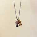 Titanium steel necklace with brown rainbow mushroom pendant and golden bead accents - Rhodonite Mushroom