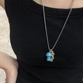 Titanium steel necklace featuring a turquoise mushroom pendant and small golden beads - Turquoise Mushroom