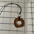 Exquisite camel bone style pendant necklace with brown cracked texture and black cord - Silver Hollow Copper Bead / Brown