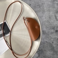 Brown leather semi-circular neck pouch with thin strap and silver ring hardware - Brown