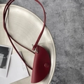 Minimalist burgundy leather neck pouch with silver ring and slender strap for glasses - Burgundy