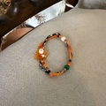 Christmas tree beaded bracelet with Santa pendant and colorful festive glass beads - Yellow Santa Claus Style