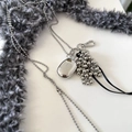 Close-up of leopard heart tassel pendant with metal beads and black cord link chain - Bottle and Grape Cluster Necklace / Approx 90cm / Silver