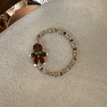 Christmas gingerbread man charm bracelet with earth tone glass beads on soft fabric - Brown Gingerbread Man Style